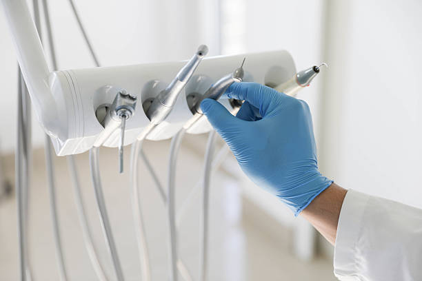 Professional Tooth Extraction technician working in Wake Village, TX